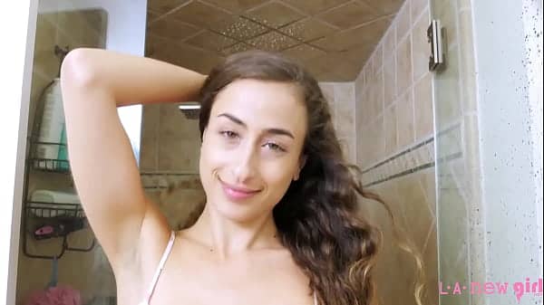 Attractive teen brunette took a shower