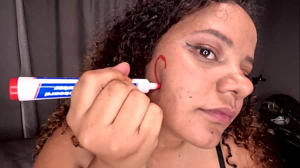 BBW colored girl DEEPTHROATING A dildo after writing dirty words on her whore face