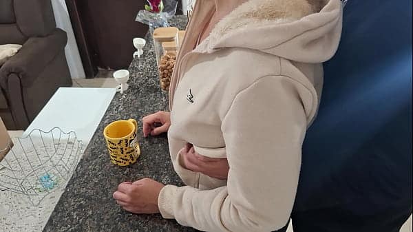 A stepdaughter is surprised while having breakfast.